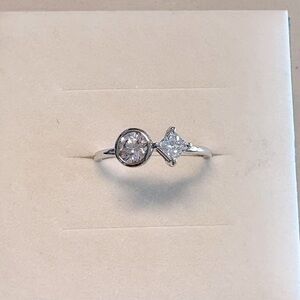 White gold and diamond toi et moi ring